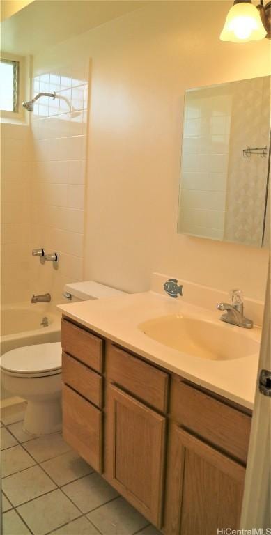 full bathroom featuring tile patterned flooring, vanity, toilet, and bathing tub / shower combination