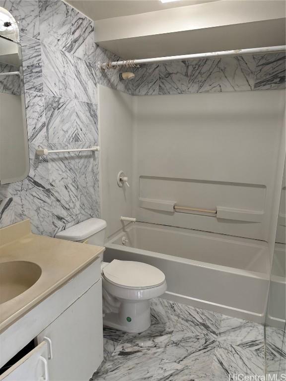 full bathroom with vanity, shower / bathing tub combination, and toilet