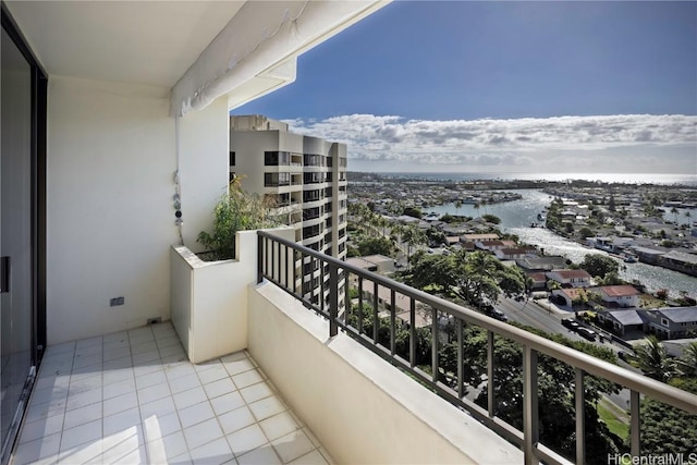 balcony featuring a water view