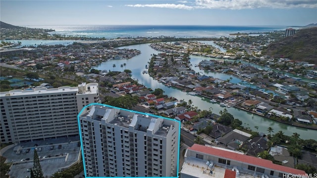 birds eye view of property featuring a water view