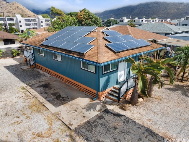 drone / aerial view featuring a mountain view