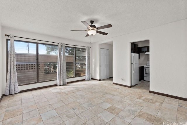 unfurnished room with a textured ceiling and ceiling fan