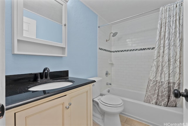 full bathroom with tile patterned floors, vanity, toilet, and shower / tub combo