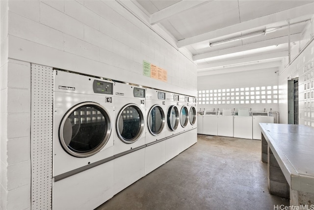 laundry room with washer and clothes dryer