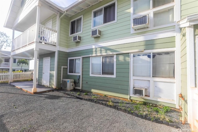 exterior space featuring a wall unit AC and ac unit