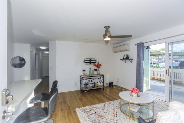 living room featuring ceiling fan, an AC wall unit, and dark wood-type flooring