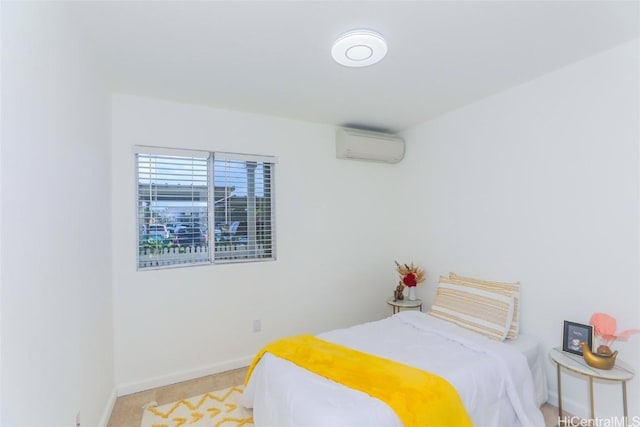 bedroom featuring a wall mounted air conditioner