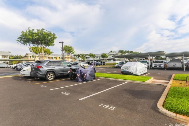 view of parking featuring a carport