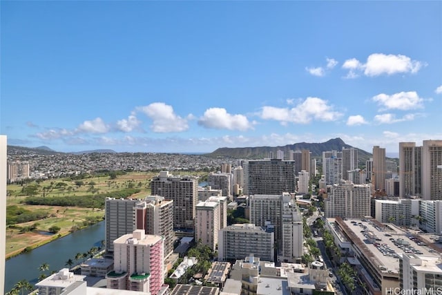 city view featuring a water and mountain view