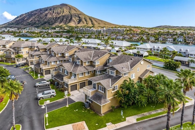 birds eye view of property featuring a mountain view