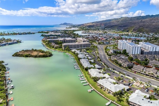 bird's eye view with a water and mountain view