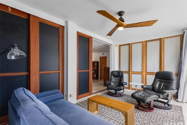 living room featuring ceiling fan