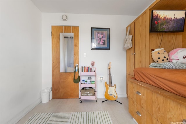419A Atkinson Dr Unit 208, Honolulu, HI 96814 - bedroom with light wood finished floors and baseboards