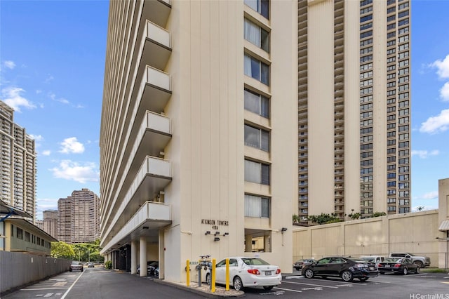 419A Atkinson Dr Unit 208, Honolulu, HI 96814 - view of apartment building / complex with uncovered parking
