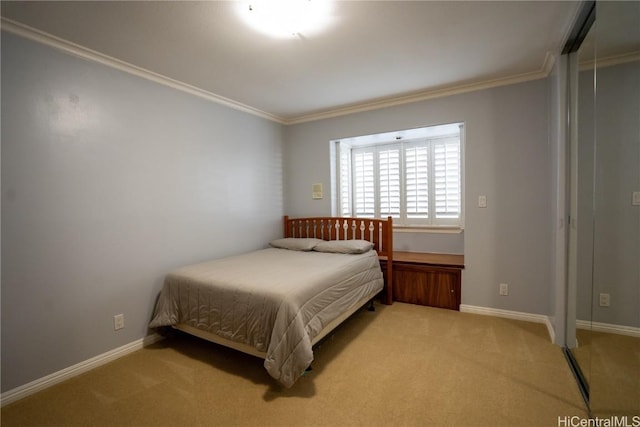 bedroom with light colored carpet, a closet, and crown molding