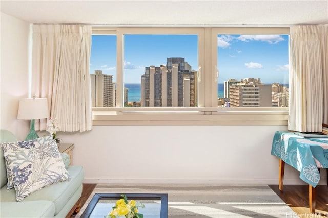 interior space featuring plenty of natural light and a water view