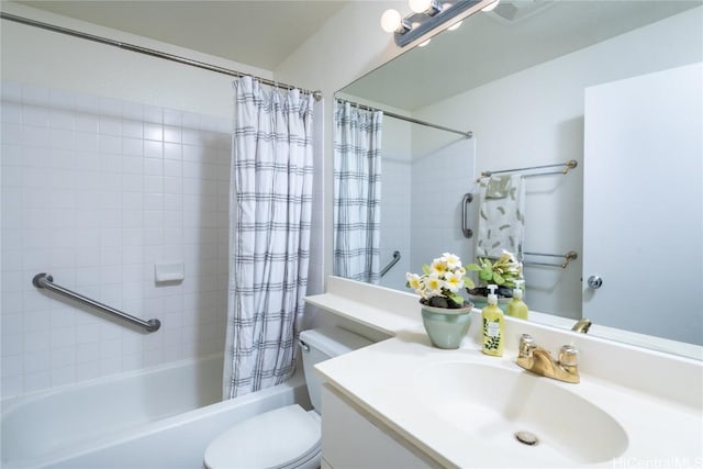 full bathroom featuring vanity, shower / bath combination with curtain, and toilet