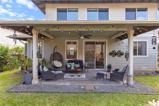 rear view of house with a patio area, ceiling fan, and an outdoor hangout area