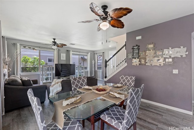 dining area with dark hardwood / wood-style floors