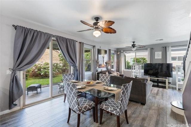 dining area featuring ceiling fan and hardwood / wood-style floors