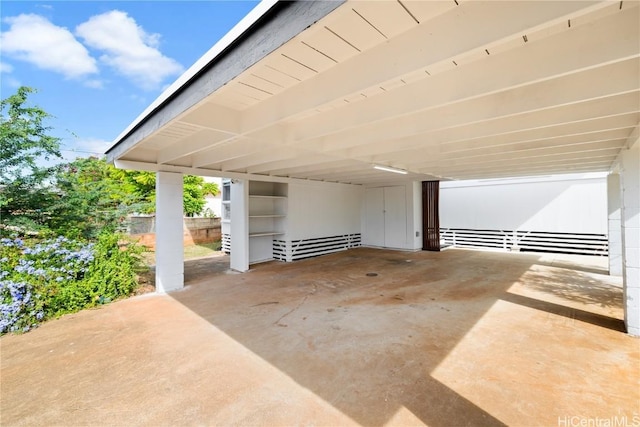 view of patio / terrace with a carport