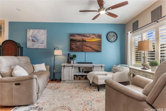 living room featuring ceiling fan