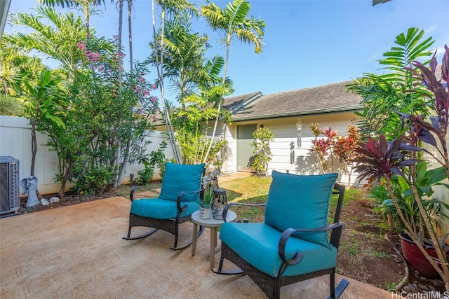 view of patio with central AC and a fenced backyard