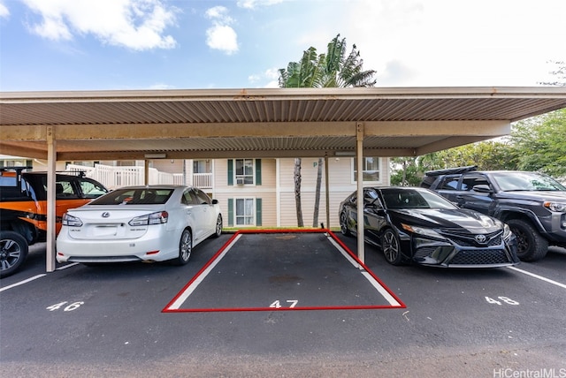 view of parking with a carport