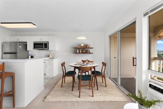 view of carpeted dining room