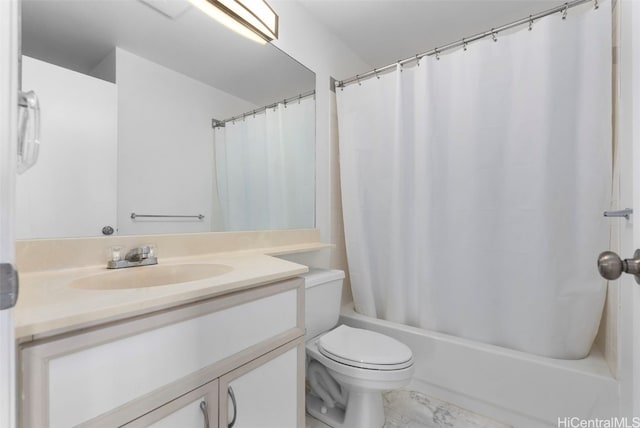 full bathroom featuring vanity, shower / bath combination with curtain, and toilet