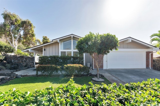 ranch-style house featuring a garage