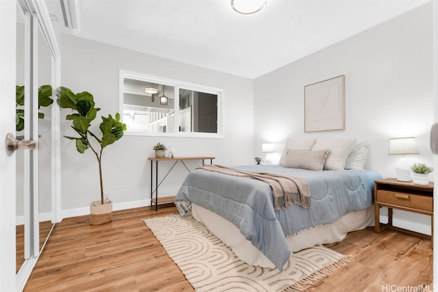 bedroom featuring light hardwood / wood-style flooring