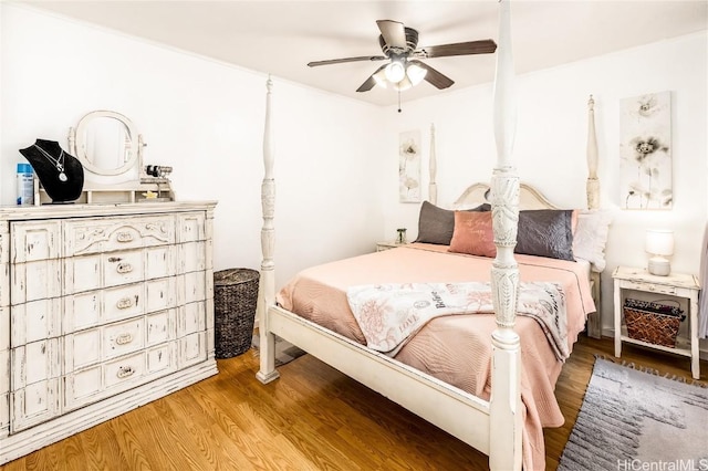 bedroom featuring ceiling fan and wood-type flooring