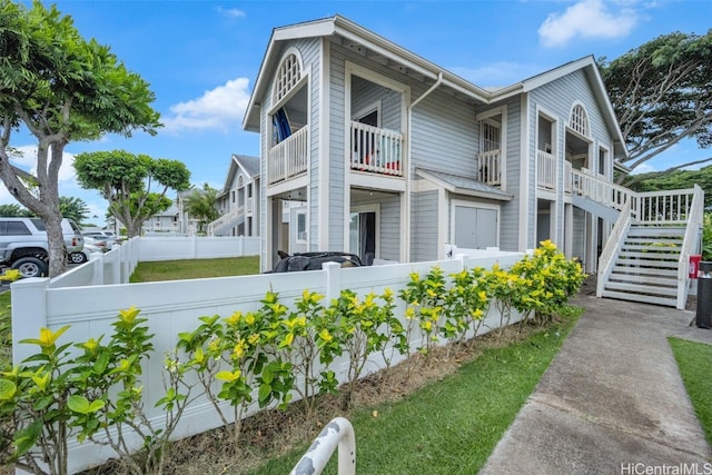 view of home's exterior featuring a balcony