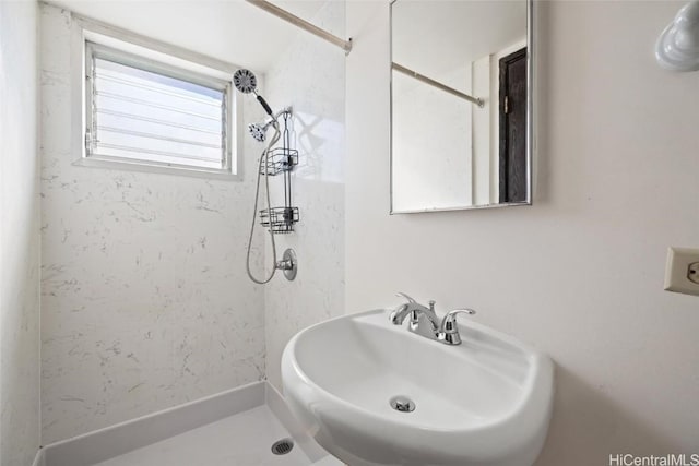 bathroom featuring sink and walk in shower