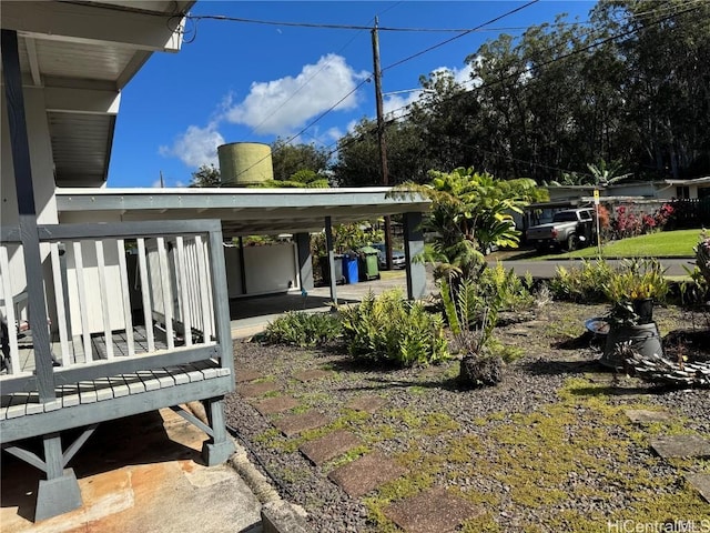 view of yard featuring a carport