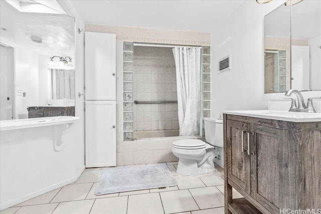 full bathroom with tile patterned floors, vanity, shower / bath combo, and toilet