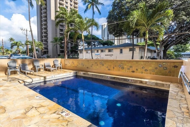 view of pool with a patio area