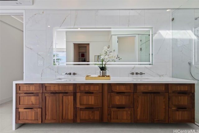 bathroom featuring walk in shower, vanity, and backsplash