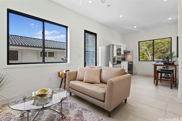 living room featuring ceiling fan