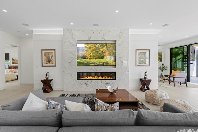 living room featuring a fireplace