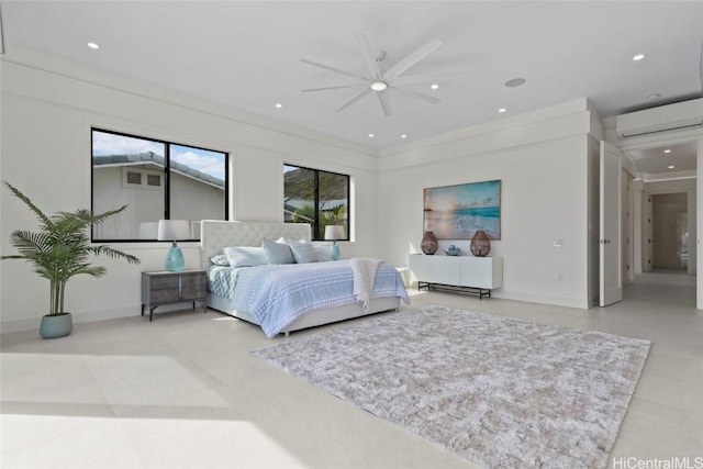 bedroom with an AC wall unit and ceiling fan