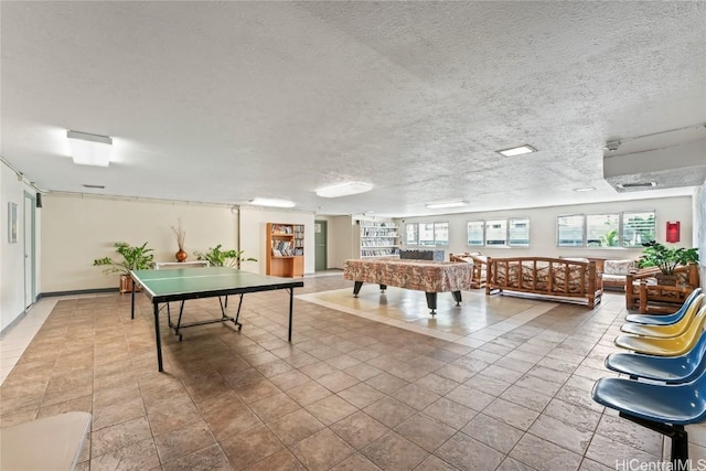 recreation room featuring a textured ceiling and billiards