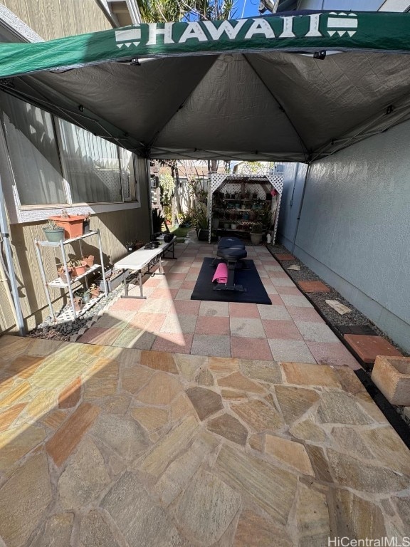 view of vehicle parking featuring a gazebo