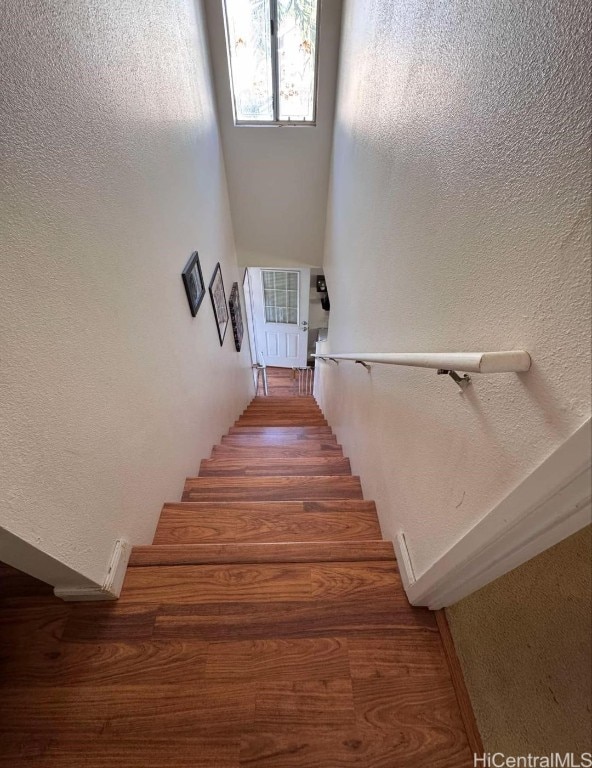 stairs with a high ceiling