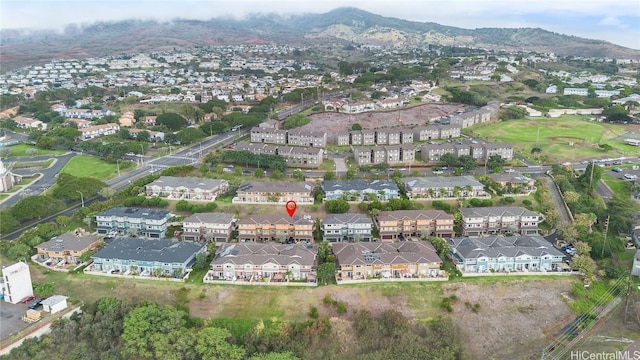 drone / aerial view featuring a mountain view