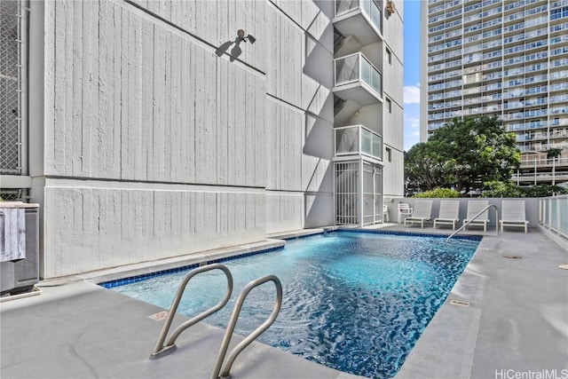 view of pool with a patio