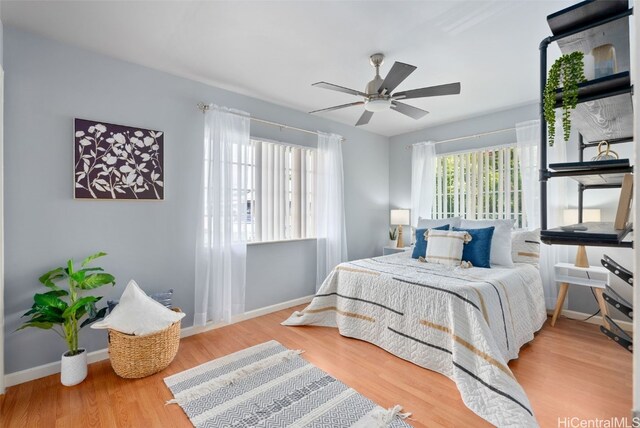 bedroom featuring ceiling fan and wood-type flooring