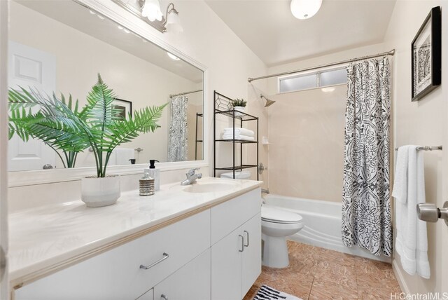 full bathroom featuring toilet, vanity, and shower / bathtub combination with curtain