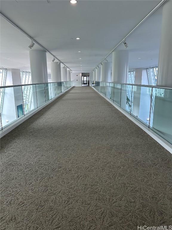 hallway featuring carpet floors